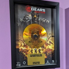 Gears Tactics A4 frame produced for Splash Damage with printed gold vinyl-effect disc and custom plaque